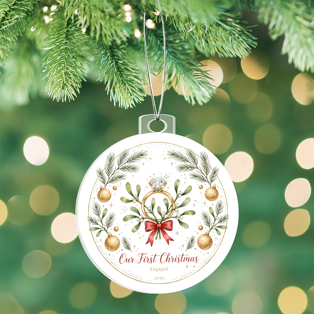 Our First Christmas Engaged 2026 — diamond ring on mistletoe